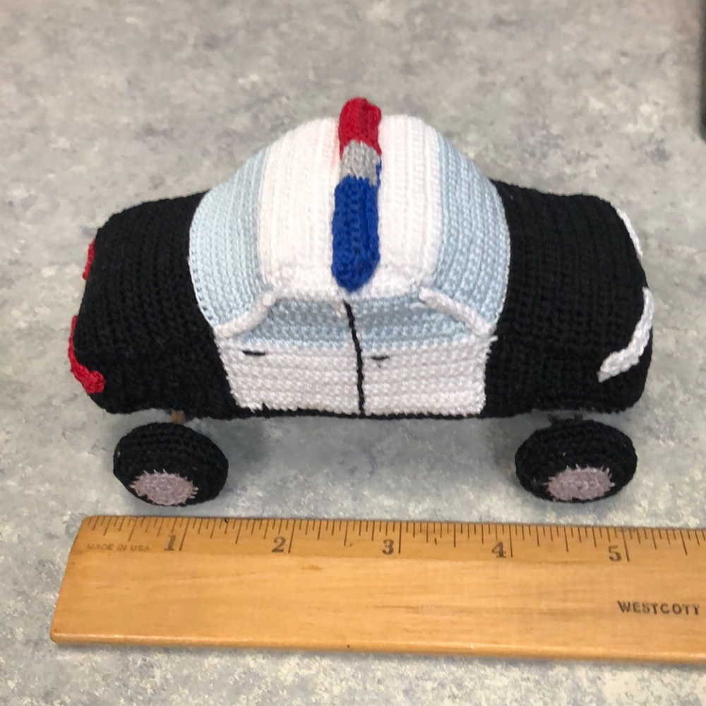 Handmade crocheted little police car